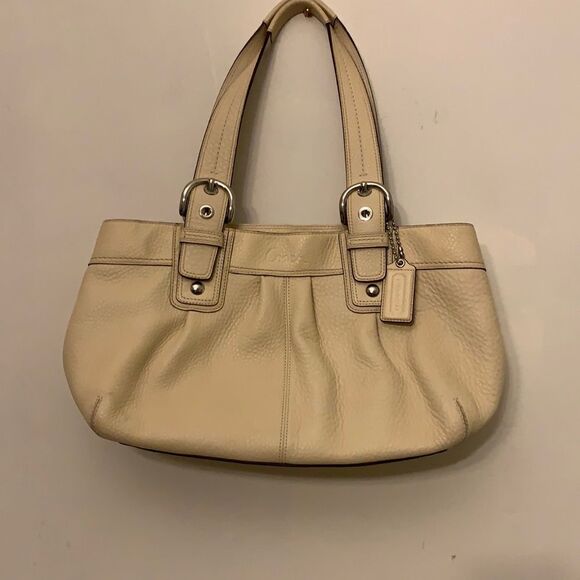 Coach Handbags - Coach cream Soho pleated leather large shoulder bag.  Zipper closure
